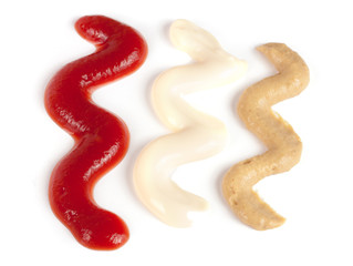 Ketchup mayonnaise and mustard isolated on white background