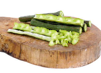 moringa isolated on wooden on white background