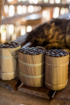 Three packages of hand made cuban cigars on workbench, Vinales, Cuba