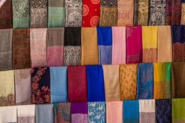 Traditional arabic scarves/shawls on an arabic market (souq), Dubai, United Arab Emirates