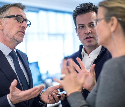 Colleagues in office having discussion