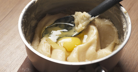 preparing choux dough in saucepan, 4k photo