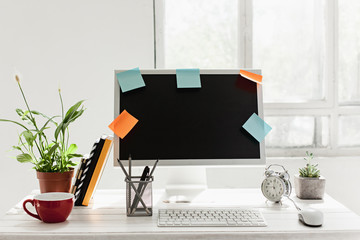 Stylish workspace with computer on home or studio