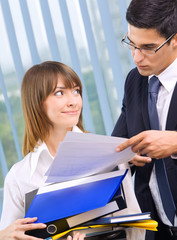 Two business people working at office