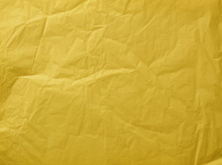 Gelbes zerknittertes Papier