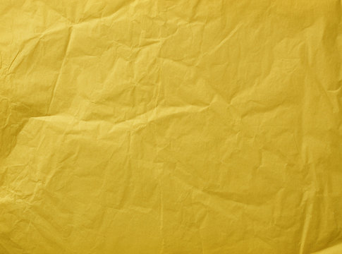 Gelbes zerknittertes Papier