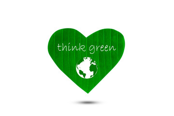 Text think green and earth on green heart shaped leaf on white background, environment concept