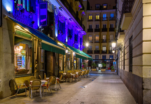 Night view of old cozy street in Madrid. Spain