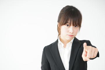 Business women pointing to something with anger