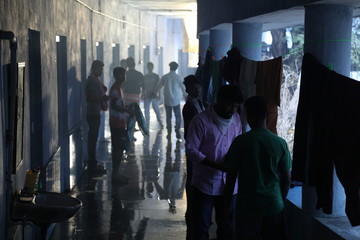 Silhouette of people in hostel