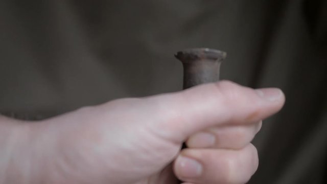 the hammer hits the chisel. Close up
