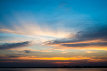 Silhouette with sunset sky at lake.