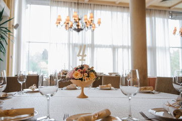 Wedding decorations. Decoration on the table. Flower composition.