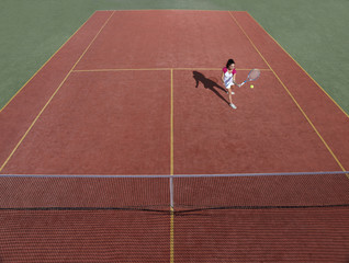tennis court with tennis player during a match game
