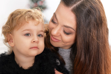 Little daughter with her mother