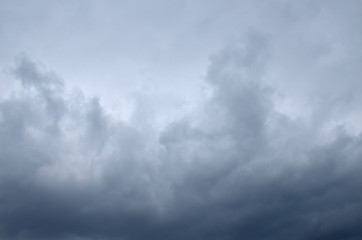 Background of dramatic stormy clouds before hard rain 