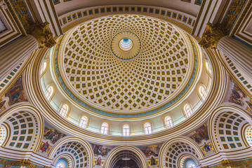 Fototapeta na wymiar Mosta, Malta - Interior shot of Mosta Dome, the Church of the Assumption of Our Lady known as Rotunda of Mosta the third largest church in Europe
