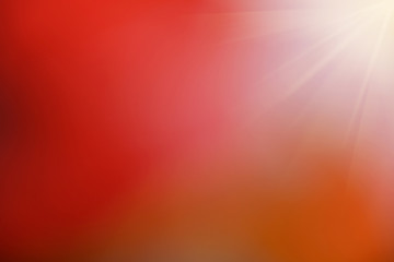 Red abstract blur background with sunshine