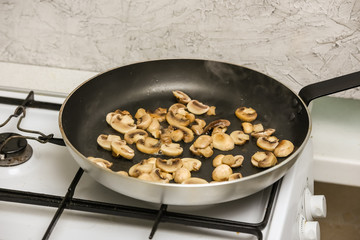 Mushrooms in frying pan