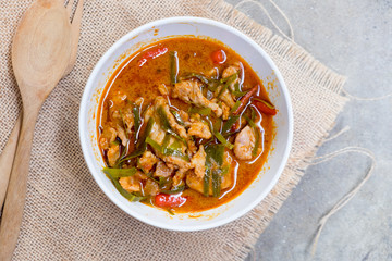 Pork in ground peanut-coconut cream curry