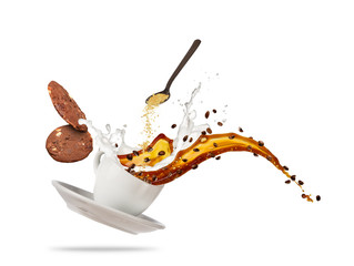 Porcelaine white cup with splashing coffee liquid and biscuits isolated on white background.