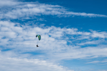 Flying paragliding on the beach