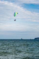Flying paragliding on the beach