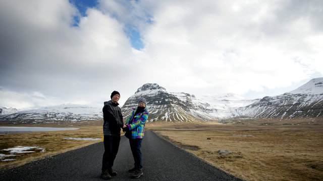 Asian senior road trip in Europe, Iceland. Abstract enjoy love and life after retirement