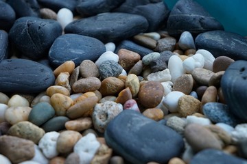 Colorful stones from the sea are a refined material.