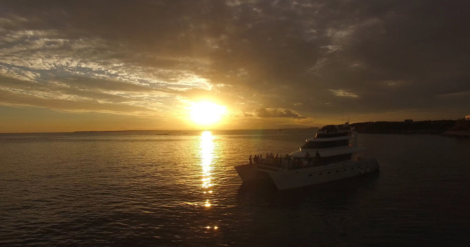 Catamaran at Sunset in Paradise Islands in Bahamas	