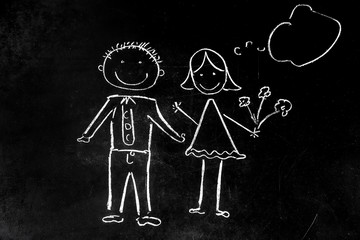 drawing with chalk on black background boy and girl