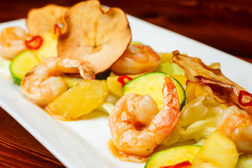 Hot prawn salad with potatoes