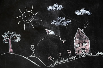chalk drawing of house and sun on a black background,