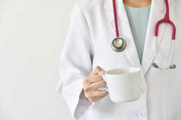 Doctor and coffee, Daily caffeine intake recommended.