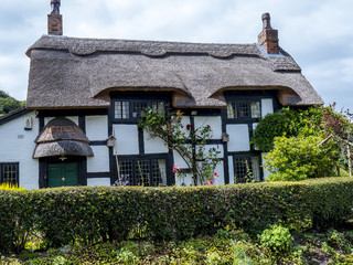 Black and White Thatched Cottage in the Cheshire Countryside near Alderley Edge England. 