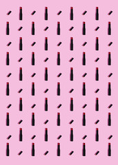 Fototapeta na wymiar Red lipsticks pattern on pink background.