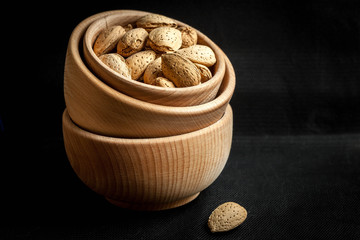 Almonds in a wooden bowl.