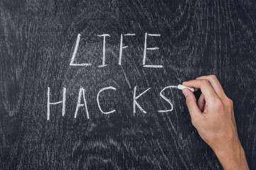 life hacks written on the blackboard using chalk