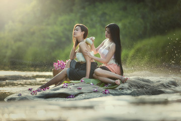  Girl relaxing in a spa in a water source.