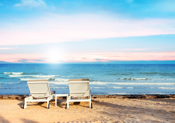 Beach chairs on the sand beach with cloudy blue sky, Relax, vacation time