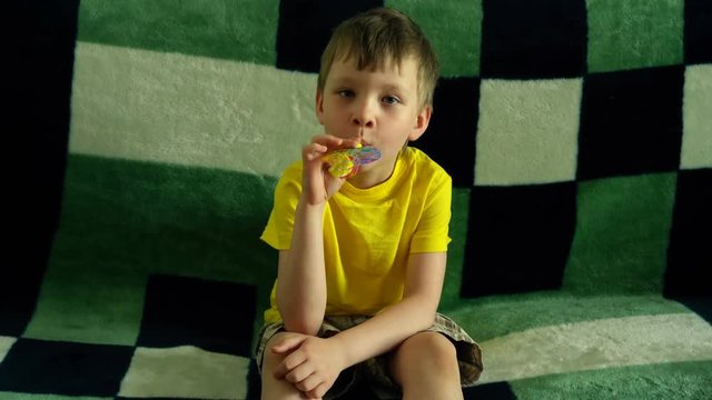 bored child with Party Horn Blower
