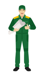 Worker holding the project plan and showing thumb up