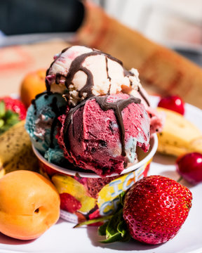 ice cream in cup with fruits