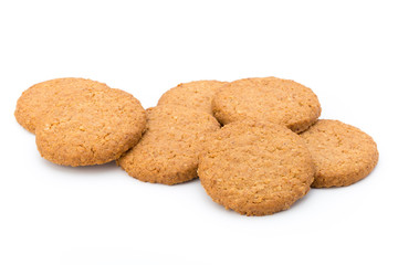 Stacked short pastry cookies isolated on white background.