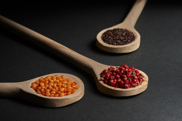 Various of spices in wooden spoons