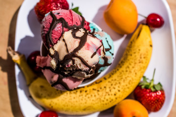 ice cream in cup with fruits