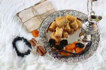 Eastern sweets table on a silver platter baklava and Tamarind