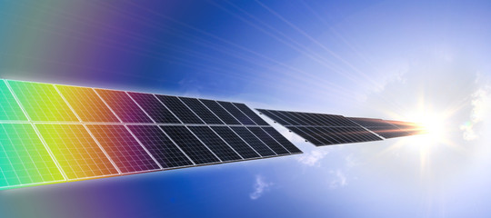 solar panels and the sun shining light on solar surface with color spectrum