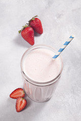 Strawberry smoothie and strawberries.
