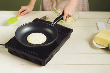 House wife wearing apron making. Steps of making cooking pancake.